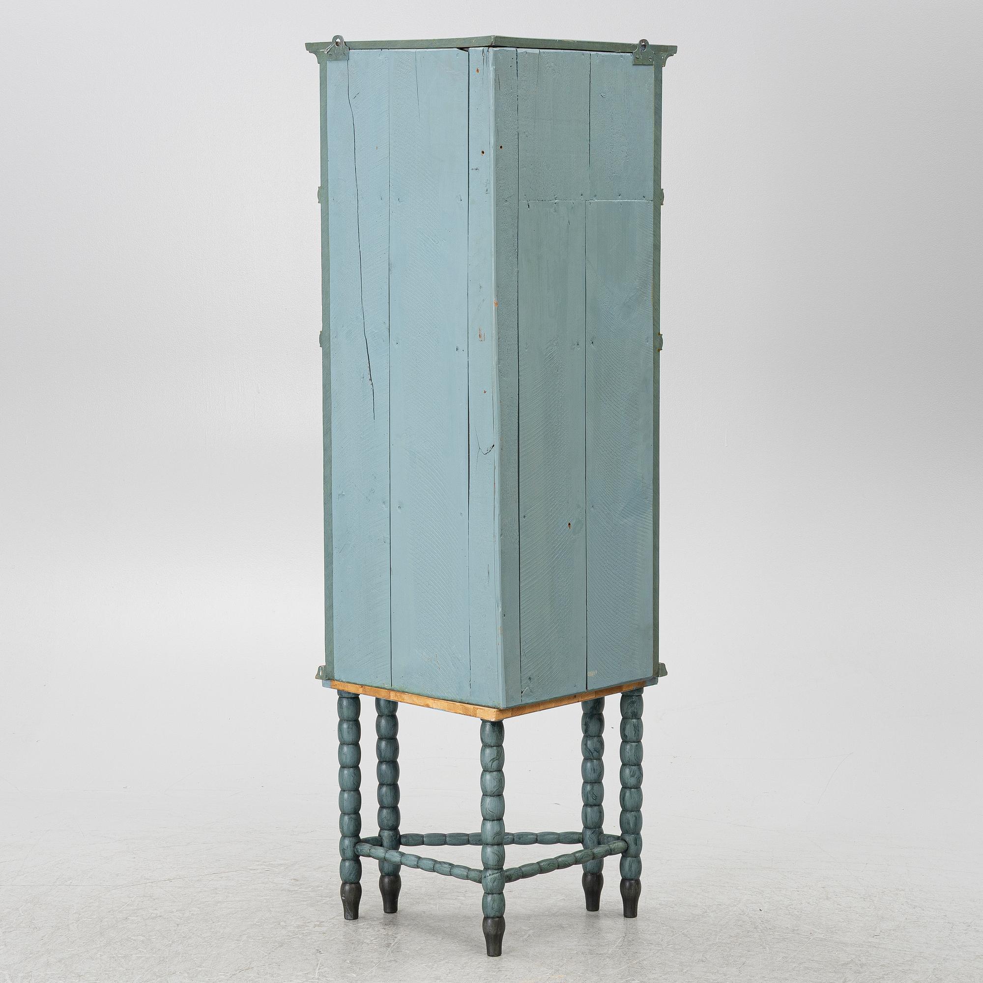 A corner cabinet, 20th century with older parts.