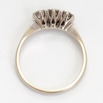 Ring, three brilliant cut diamonds, 18K white gold, H. Lahtinen & Co., 1985.