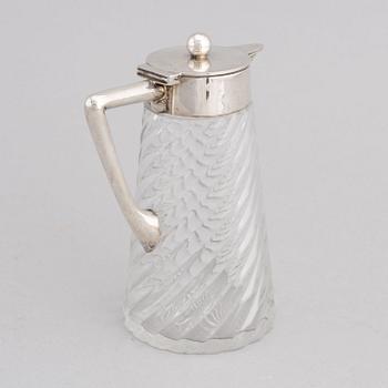A German glass and silver carafe, mark of Wilhelm Binder, Bremen, Schwäbisch Gmünd, circa 1900.