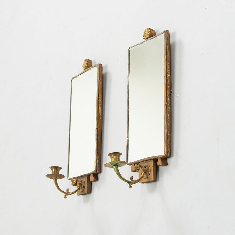 A pair of mirror sconces, 19th century.