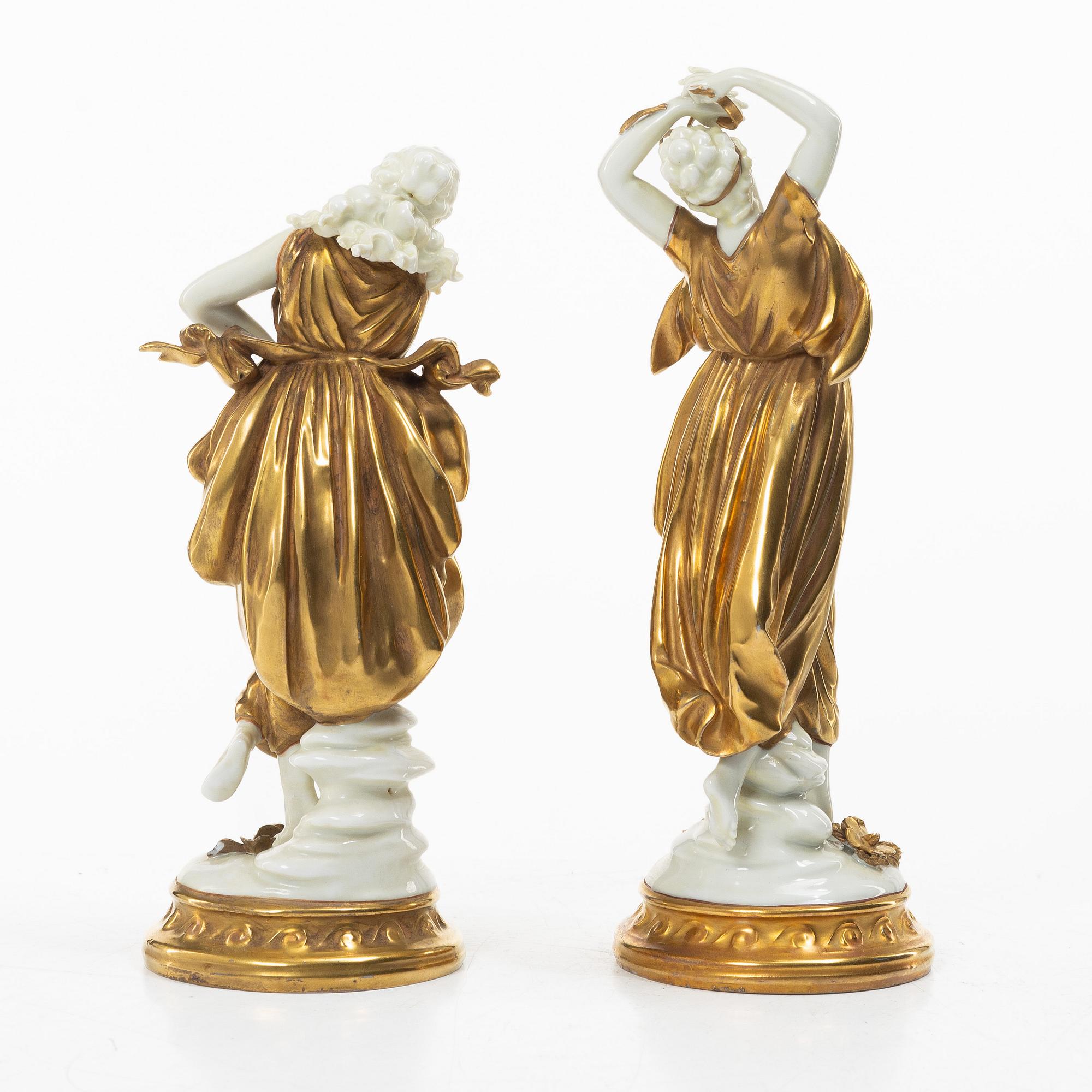 A pair of gilt "Muse" porcelain figurines, Volkstedt, first part of the 20th century.
