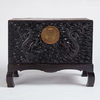 A massive 'five clawed dragon' hardwood storage chest, Qing dynasty, 19th century.