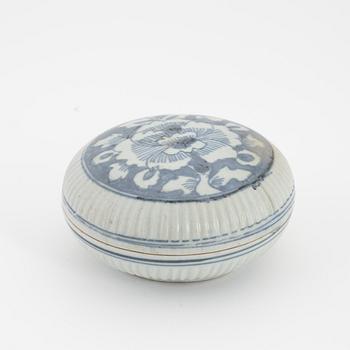 A Chinese blue and white box with cover, Ming dynasty, 17th century and three bowls, Southeast Asia, 19th/20th century.