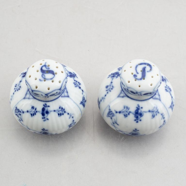 A group of three egg cups, a pair of salt/pepper shakers and two sauce boats, "Blue Fluted"/"Musselmalet", Royal Copenha.