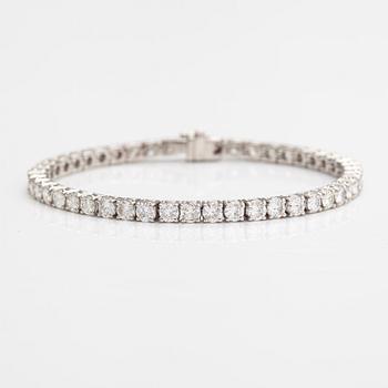 Tennisrannekoru, 18K valkokultaa, briljanttihiottuja timantteja n. 7.00 ct yht.