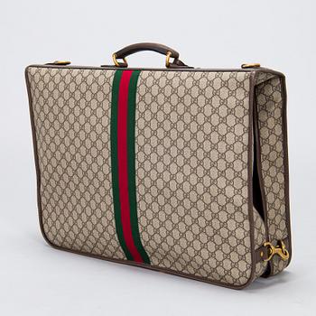 Gucci, a 'Savoy' garment bag.