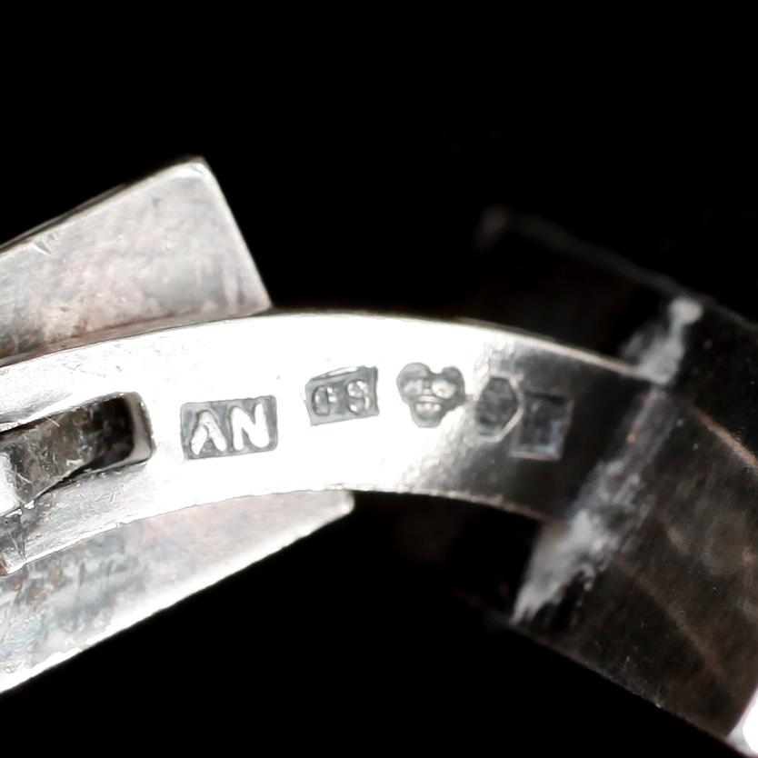 SLIPSNÅL SAMT MANSCHETTKNAPPAR, 1 par, silver, Wiwen Nilsson, 1940. Vikt ca 19 gram.