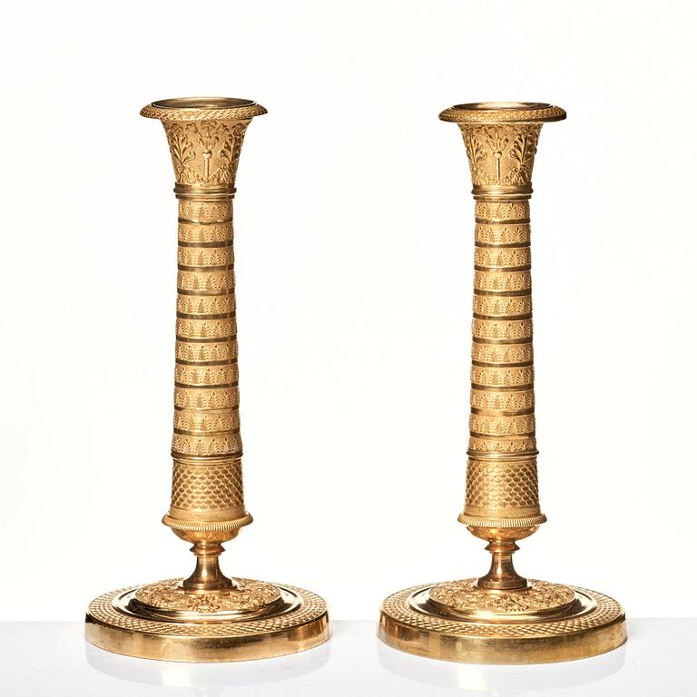 A pair of Empire candlesticks.