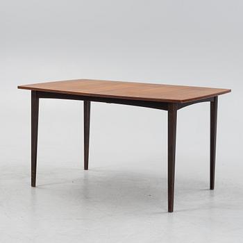 A teak dining table, mid 20th Century.