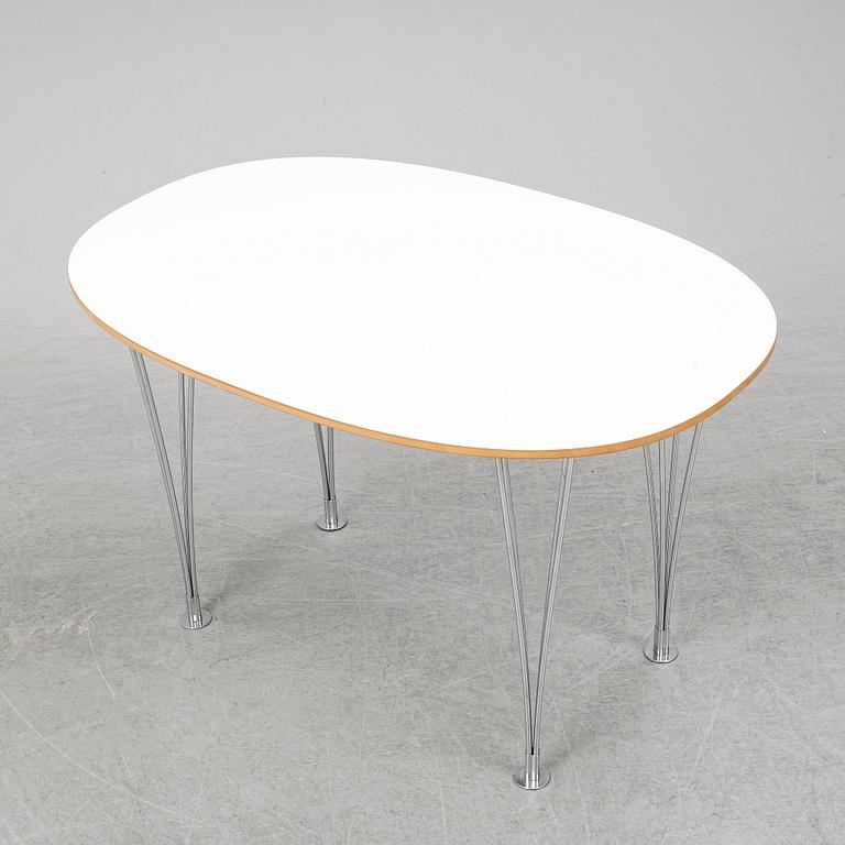 A 'Superellips" table by Bruno Mathsson & Piet Hein for Mathsson International darted 2011.