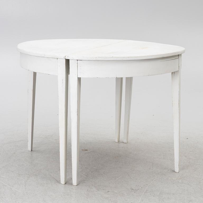 A pair of moon tables, 19th century.