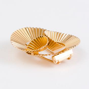 CARTIER, A 14K gold brooch . Marked 289C.