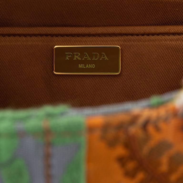 Prada, a embroidered silk 'Broccato patch' bag.
