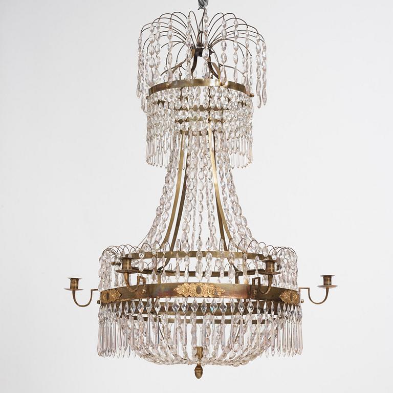 A late Gustavian gilt brass and cut glass seven-light chandelier, circa 1800.