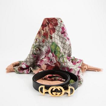 Gucci, belt and shawl.