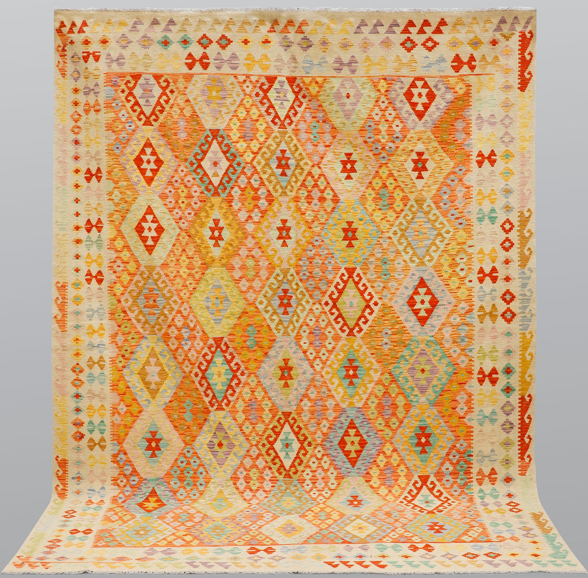 A carpet, Kilim, ca 344 x 252 cm.