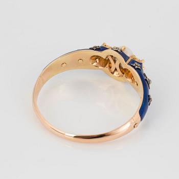 A BANGLE set with a pearl, rose- and old-cut diamonds and blue enamel ground.