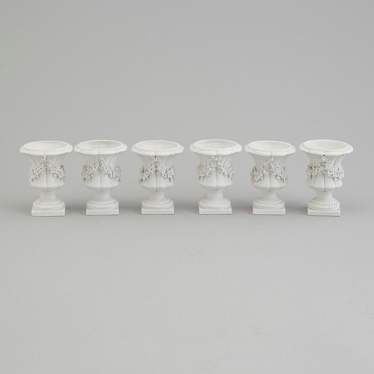 Six bisquit porcelain miniture vases, circa 1900, with Sevres like mark.