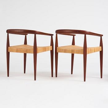 Nanna Ditzel, a pair of teak and rattan model 113 chairs, Poul Kold Savverk, Denmark, post 1955.