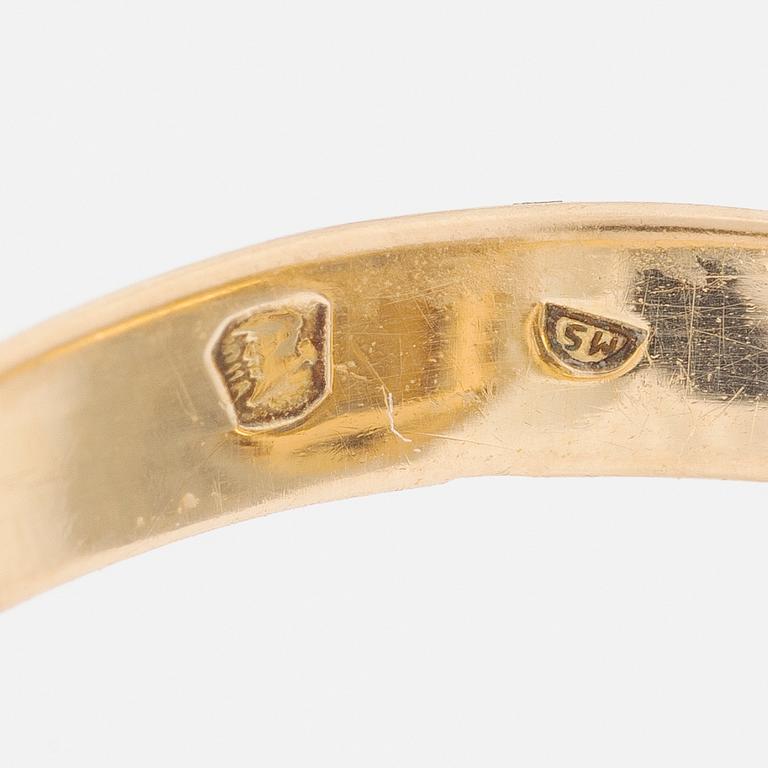 Ring in 14K gold with a faceted topaz and rose-cut diamonds.