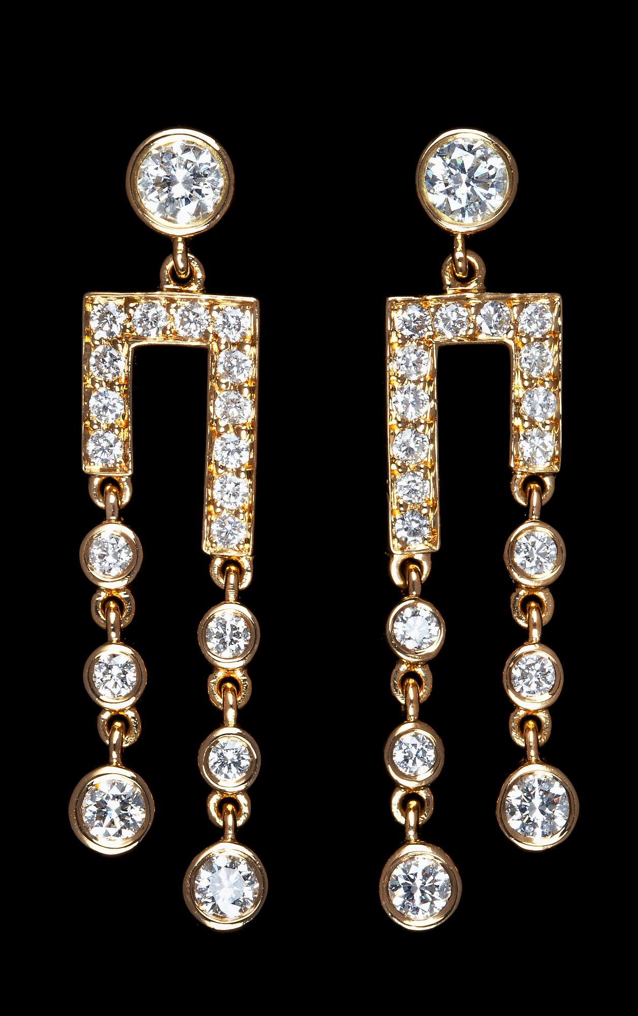 A pair of diamond earpendants, tot. app. 1.45 cts.