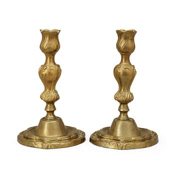 667. A pair of Swedish Rococo "argent haché" candlesticks by C.  C. Liendenberg, Stockholm 1767.