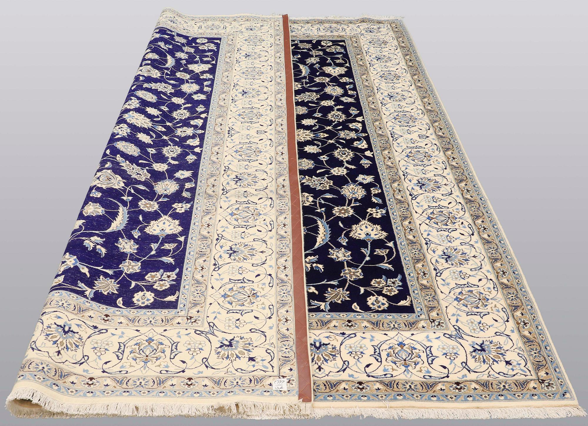 A carpet, Nain part silk, 350 x 250 cm.