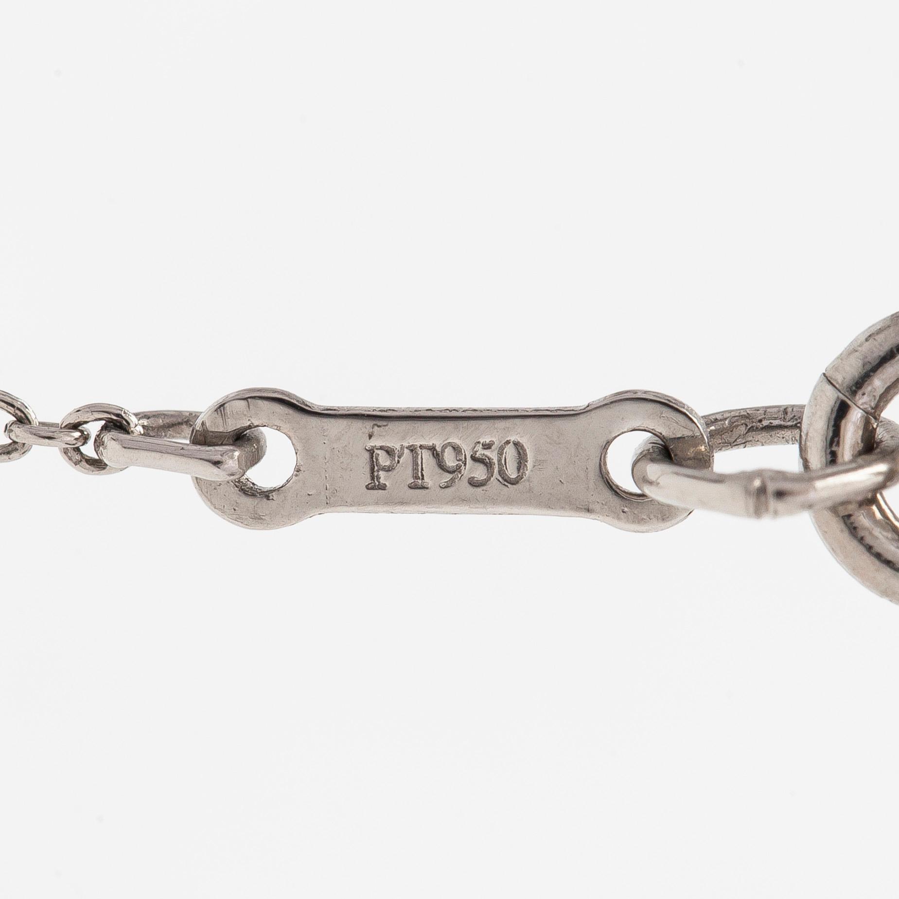 Tiffany & Co, Elsa Peretti, kaulakoru, risti, platinaa.