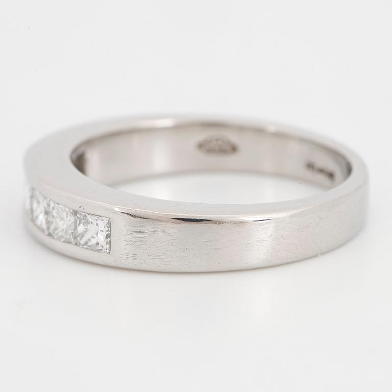 Platinum and six princess-cut diamond ring.