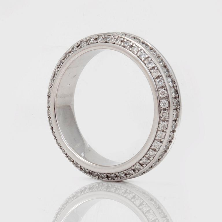 A brilliant-cut diamond eternity ring.