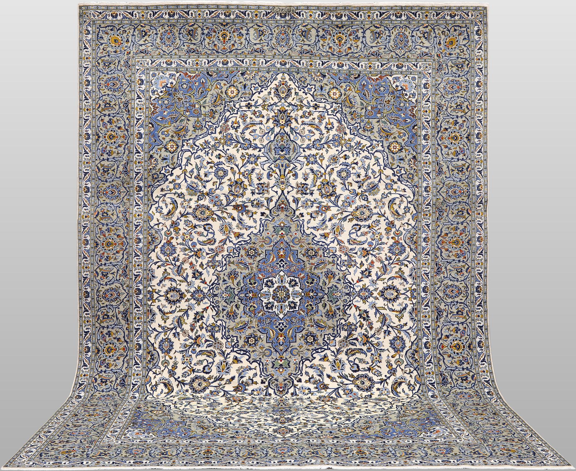 A Keshan carpet, signed, 386 x 281 cm.