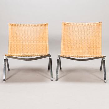 POUL KJAERHOLM, two 'PK-22' easy chairs, Fritz Hansen, Denmark 1999.