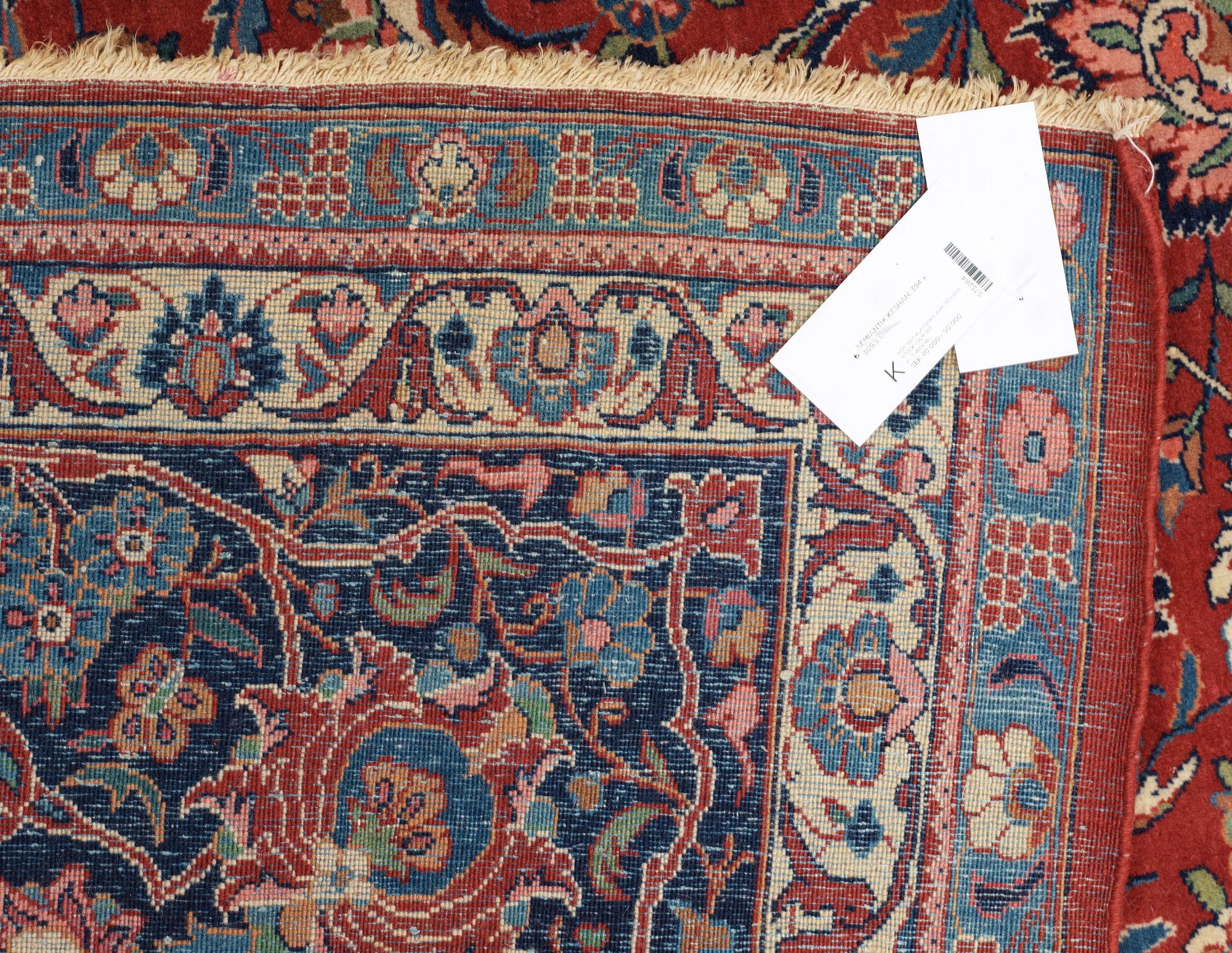 SEMI-ANTIQUE KASHAN. 394 x 309,5 cm.
