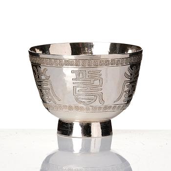 A set of six silver cups with holders, China, 20th century.