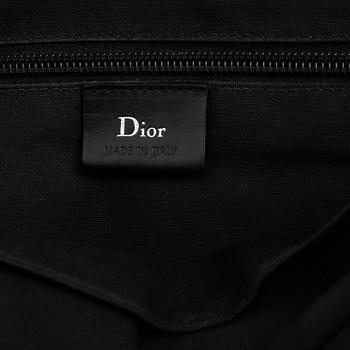Christian Dior, a black leather briefcase.