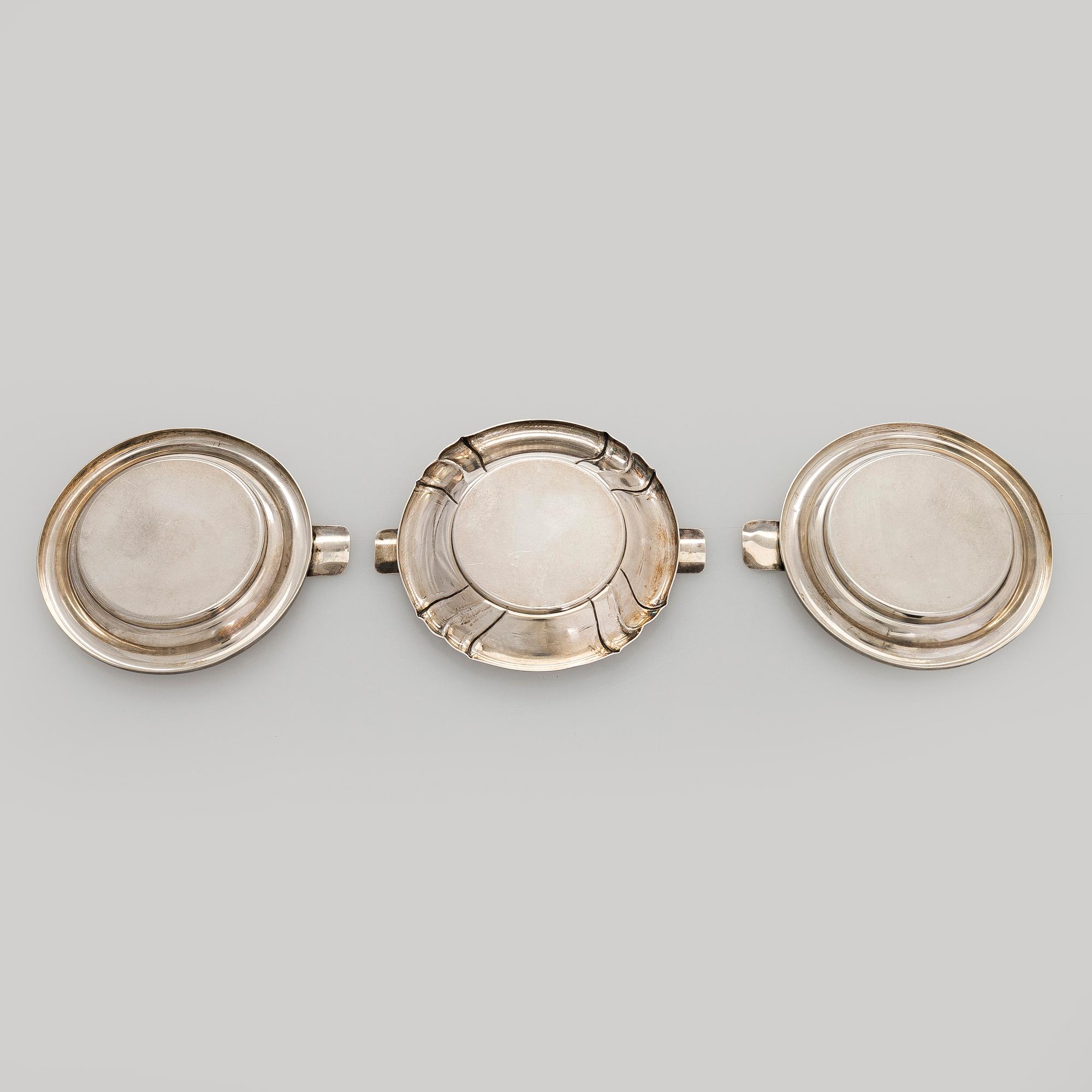 A silver cigarette case, matchbox holder and small bowl, Sandrik, as well as 3 ashtrays, Czechoslovakia 1929-1945.