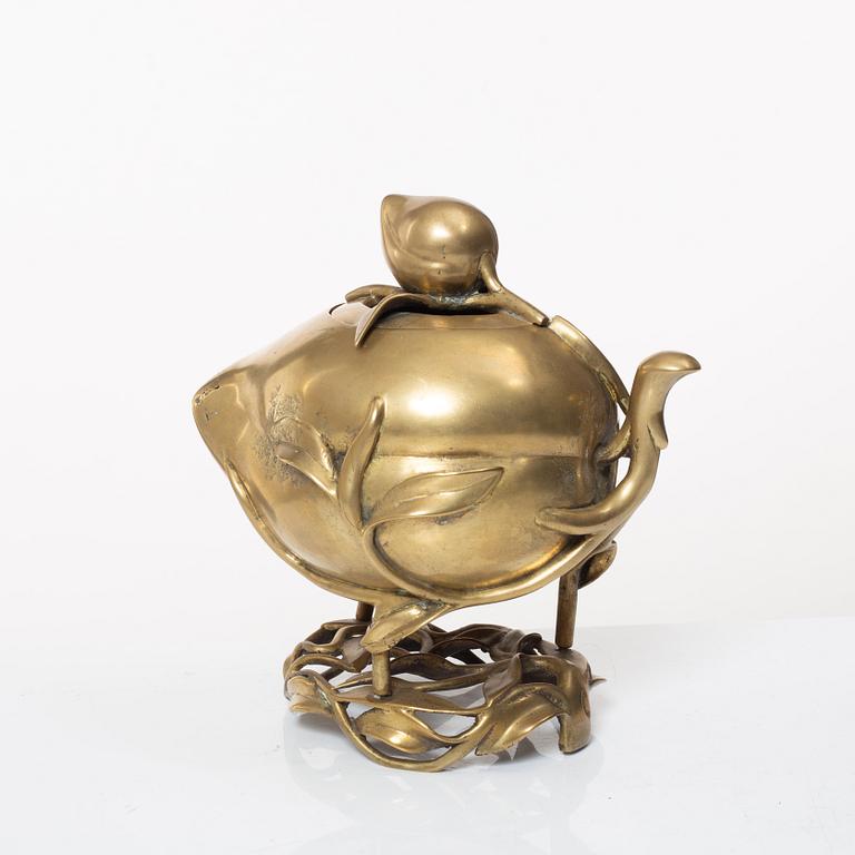 A Chinese brass 'peach' censer, first part of of the 20th century.