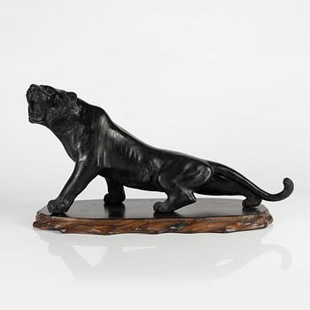 A Japanese bronze sculpture of a tiger, 20th Century.