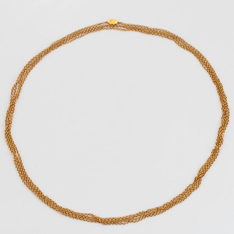 An 18K gold chain.