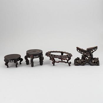 A group of Chinese wooden stands, 19th/20th Century. (13 pieces).