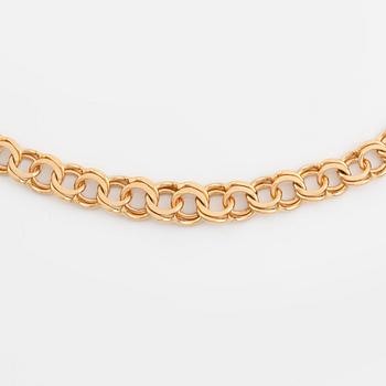 Collier 18K guld, doserad bismarck, med berlock.