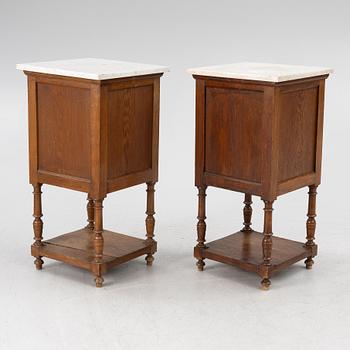 Á pair of bedside tables, circa 1900.