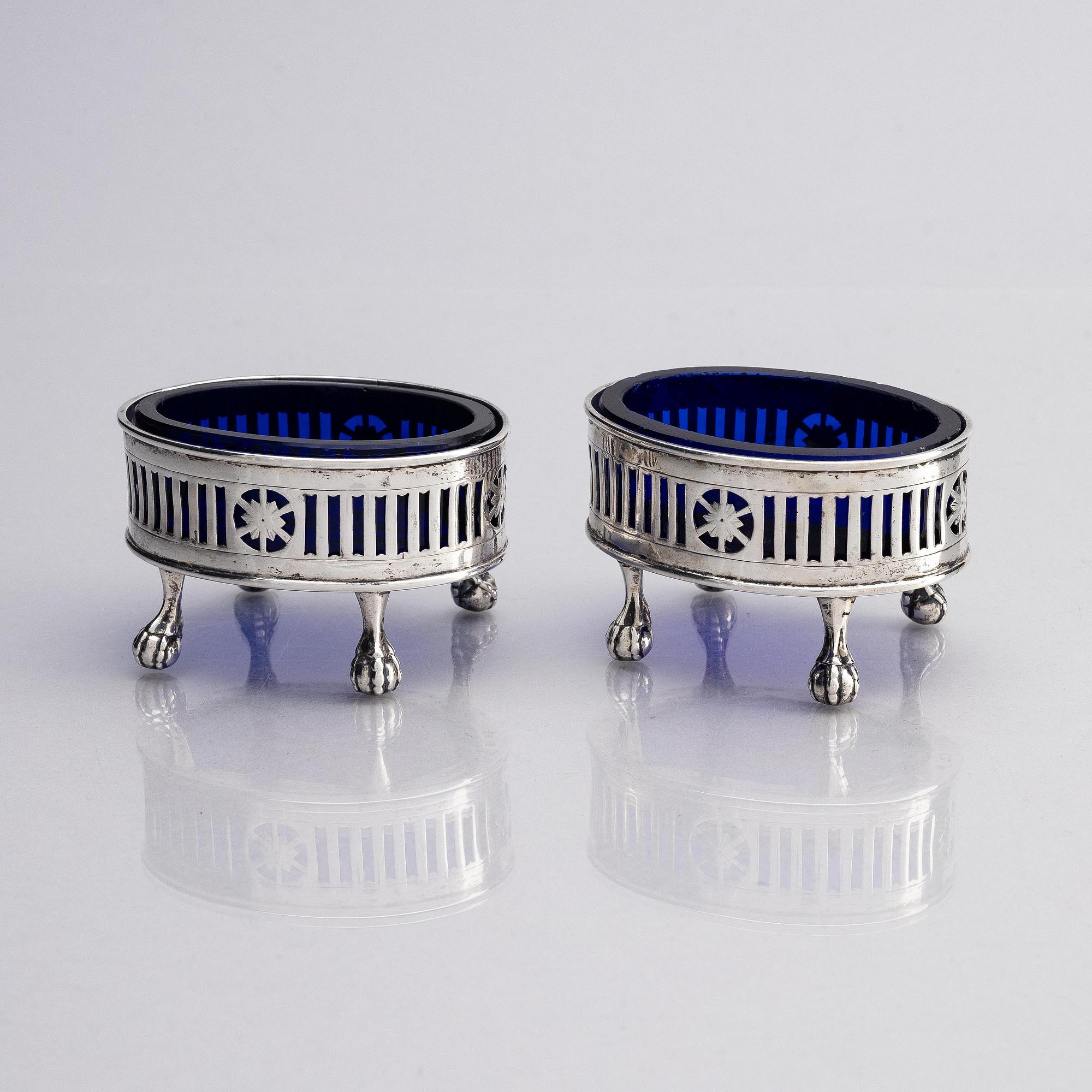 A pair of Swedish silver and glass salt cellars, marks of Arvid Floberg, Stockholm 1785.