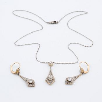 A pendant with a pair off earrings with old-cut diamonds ca 1.10 cts. 1920.