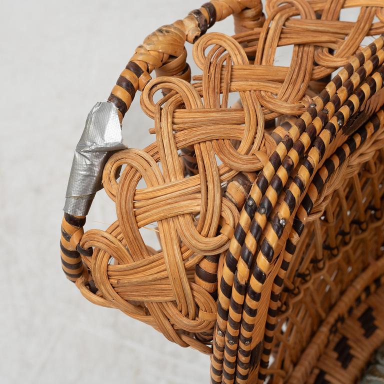 A peacock rattan chair, 20th Century.