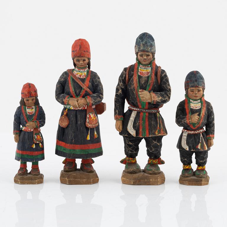 Torborg Lindberg, four carved and painted wooden figures, signed T.L.