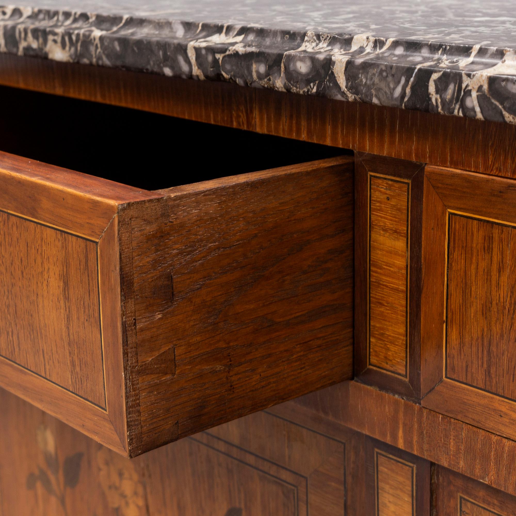 A French Louis XVI-style cupboard, ca 1900.
