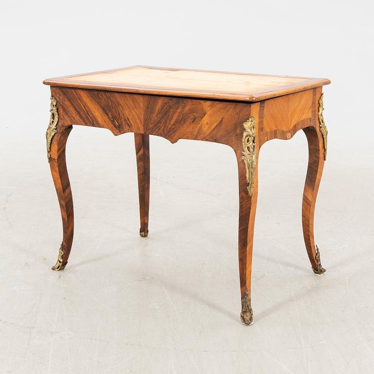 A Louis XVI style desk around 1900.