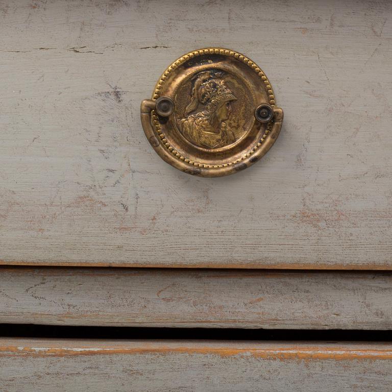 A mid 19th century painted chest of drawers.