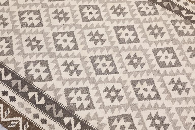 A Kilim rug, approx. 240 x 172 cm.